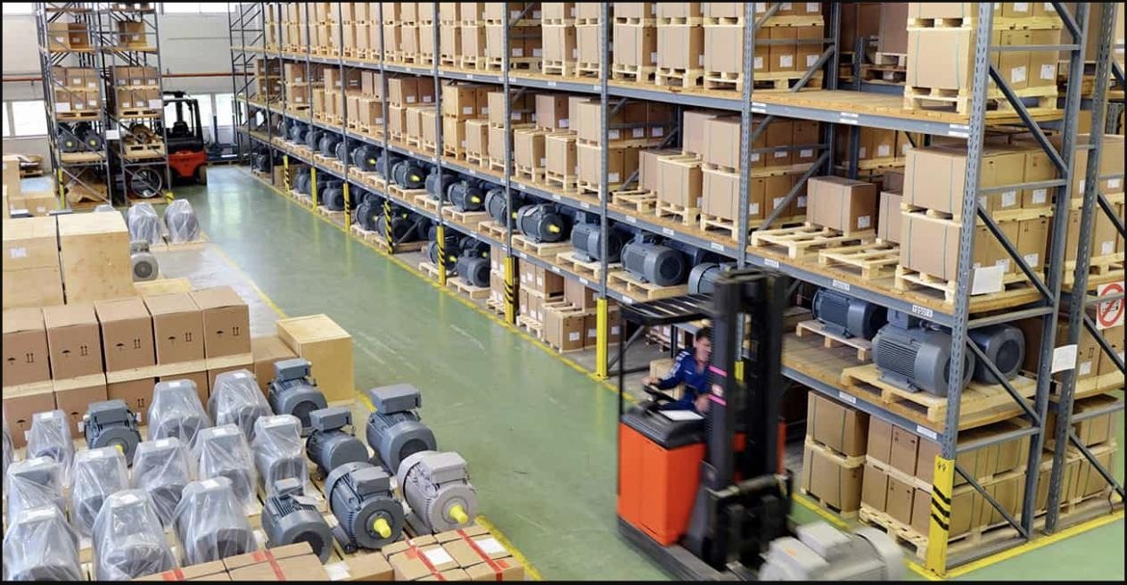 Motor and box stacks in a warehouse, forklift operation
